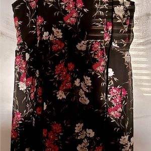 Torrid floral dress black with pink and tan flowers on it. Lined, worn twice.